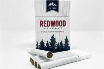 Redwood Reserve original CBD hemp flower cigarette box with five cigarettes laying in front.
