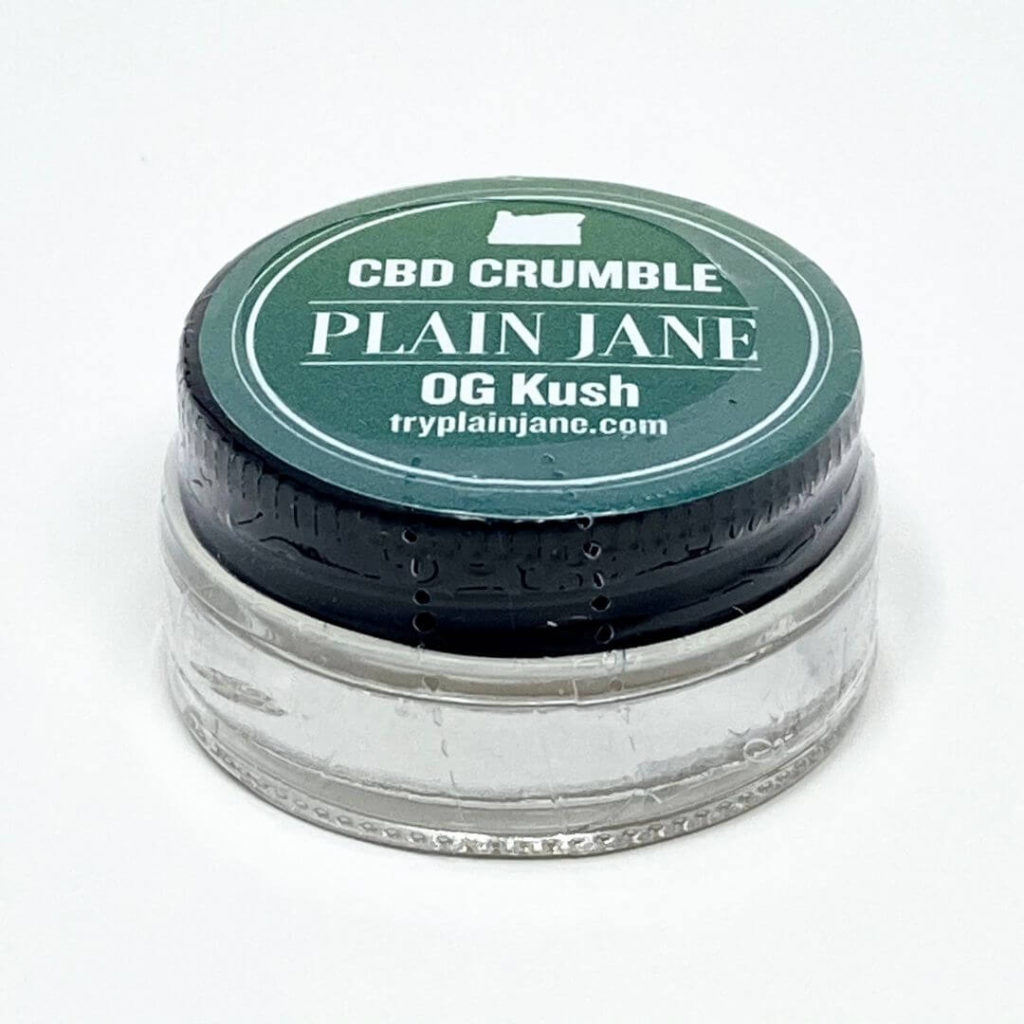 Jar of Plain Jane og kush CBD crumble stilled sealed in plastic.